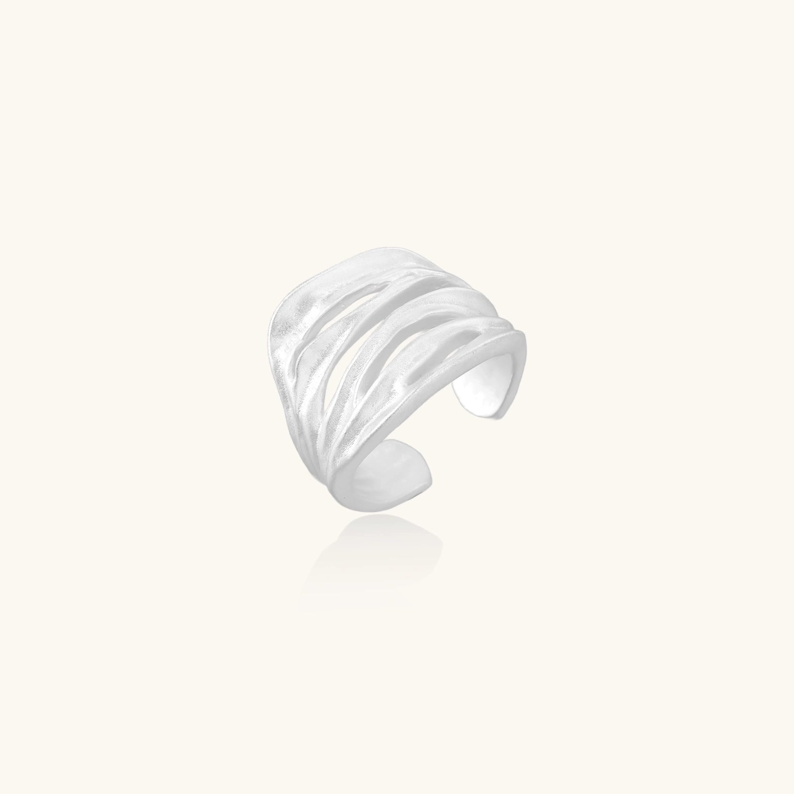 Side view of carved ridge silver ring showing wave texture in 925 sterling silver