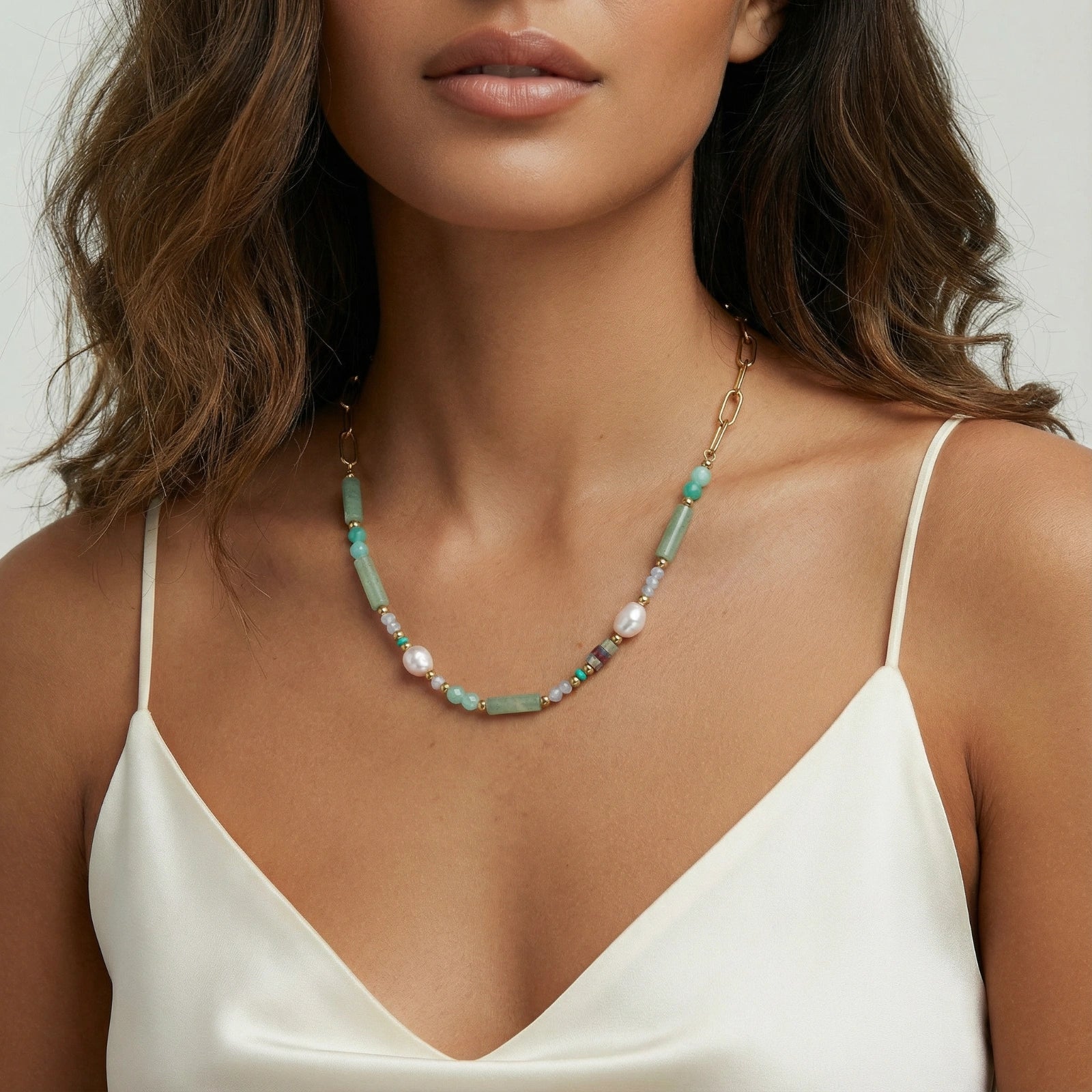 Woman wearing seafoam quartz pearl beaded necklace with prasem quartz and baroque pearls by VAHN Jewels