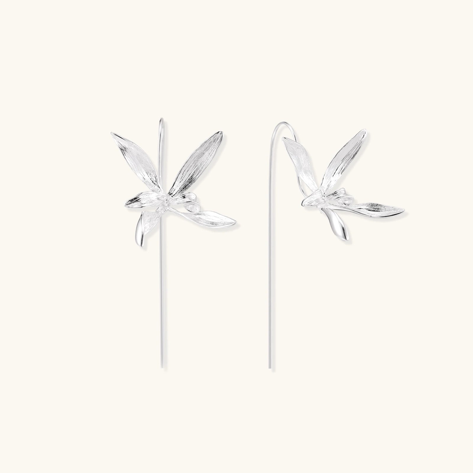 Pair view of silver dragonfly threader earrings showing sculpted wings and threader chain by VAHN Jewels