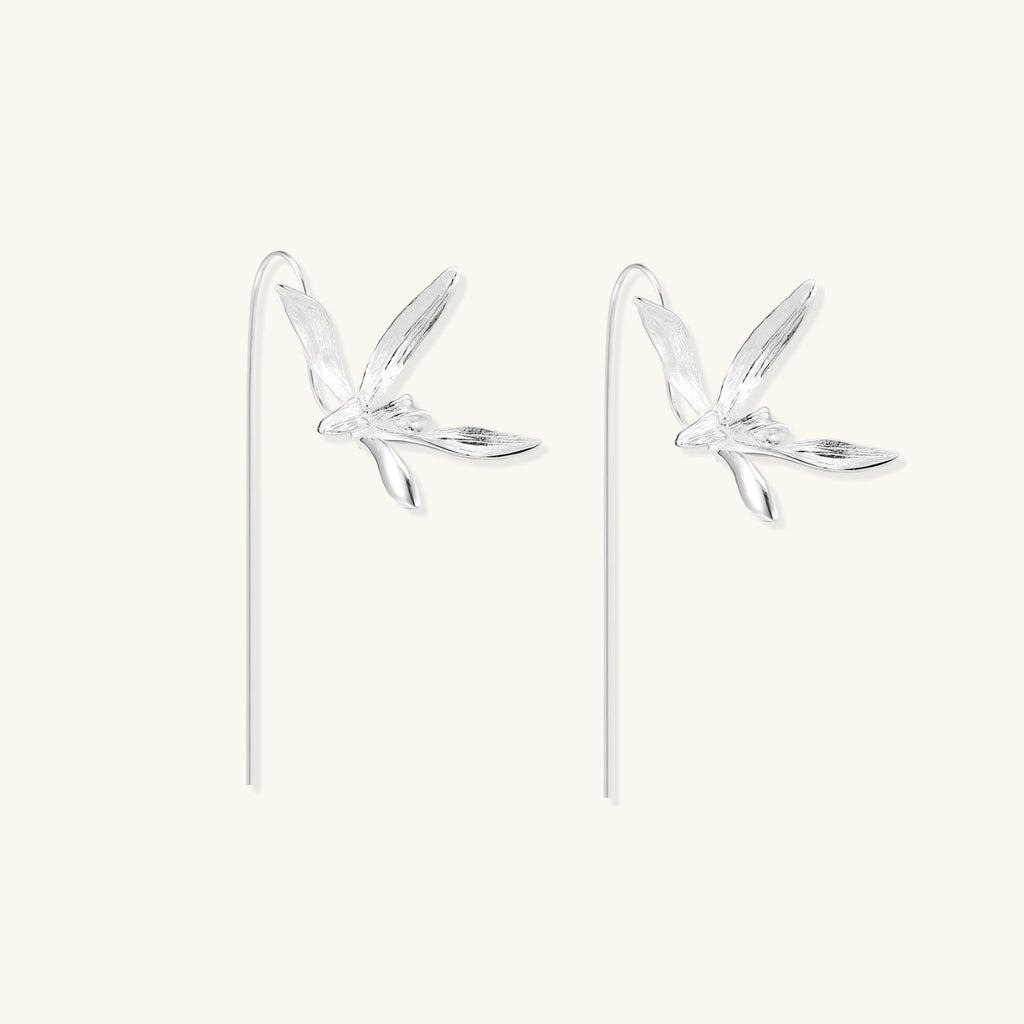 Detail view of brushed dragonfly wings on 925 sterling silver threader earrings by VAHN Jewels