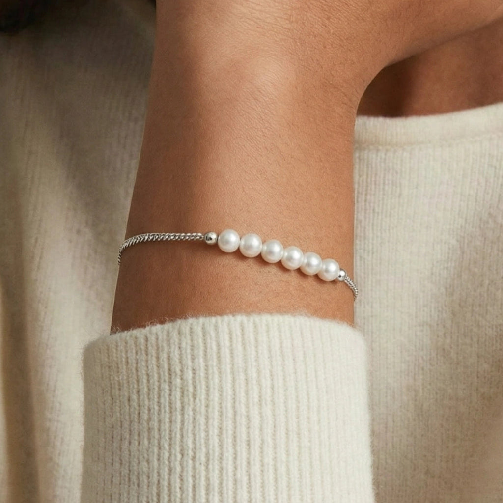 Woman wearing fine pearl chain bracelet in silver | VAHN Jewels