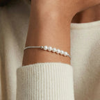 Woman wearing fine pearl chain bracelet in silver | VAHN Jewels