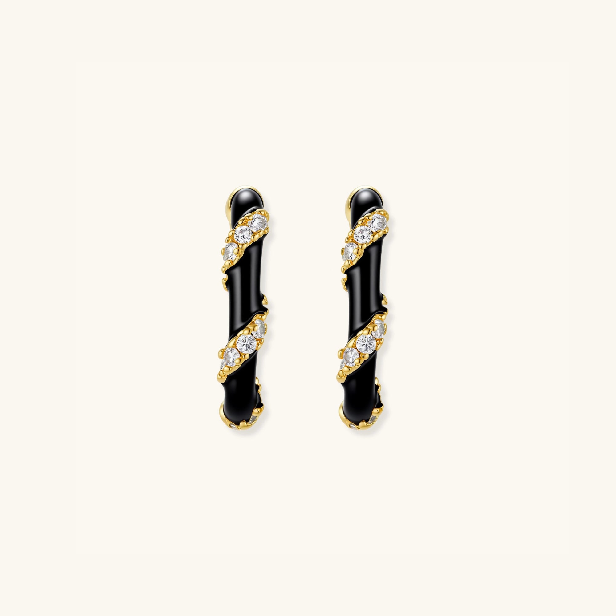 Striped black and gold enamel hoop earrings in 14K gold-plated 925 sterling silver with cubic zirconia, front view | VAHN Jewels