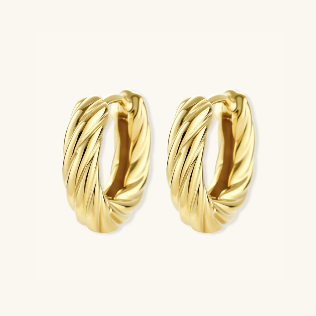 Standing view of twisted rope gold huggie earrings showing thick rope texture in 14K gold-plated 925 silver by VAHN Jewels