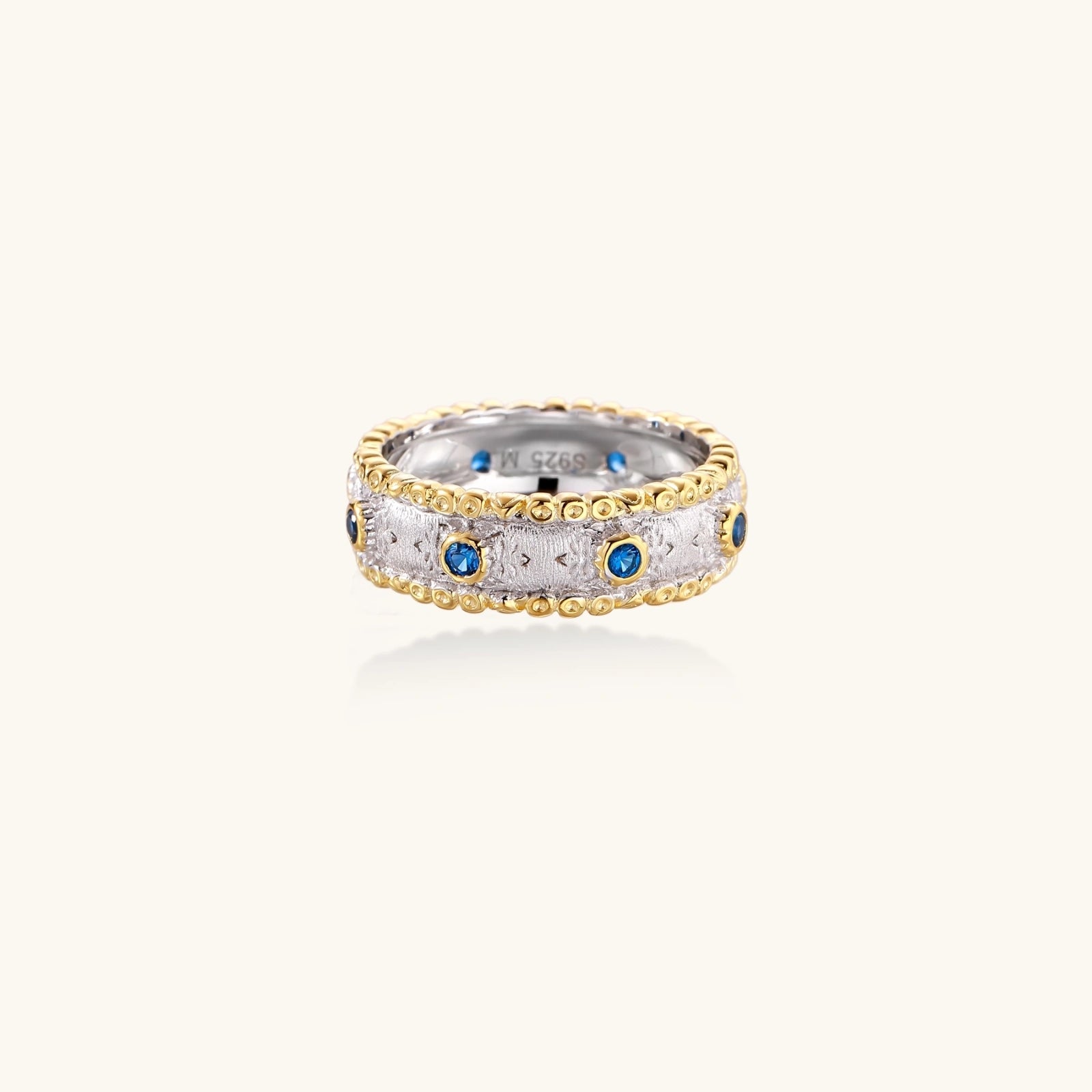 Two-tone textured band ring in 24K gold vermeil over 925 sterling silver with blue zirconia, front view | VAHN Jewels