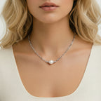 Woman wearing Luna Pearl Chain necklace in rhodium-plated 925 sterling silver with single freshwater pearl by VAHN Jewels