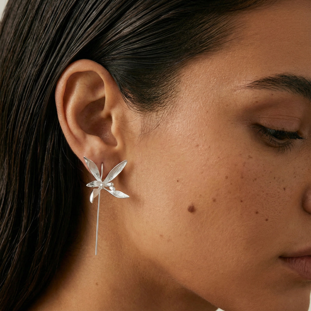 Woman wearing silver dragonfly threader earrings in 925 sterling silver by VAHN Jewels