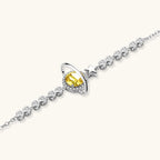 Detail of yellow moissanite Saturn pendant with star charm in 925 sterling silver