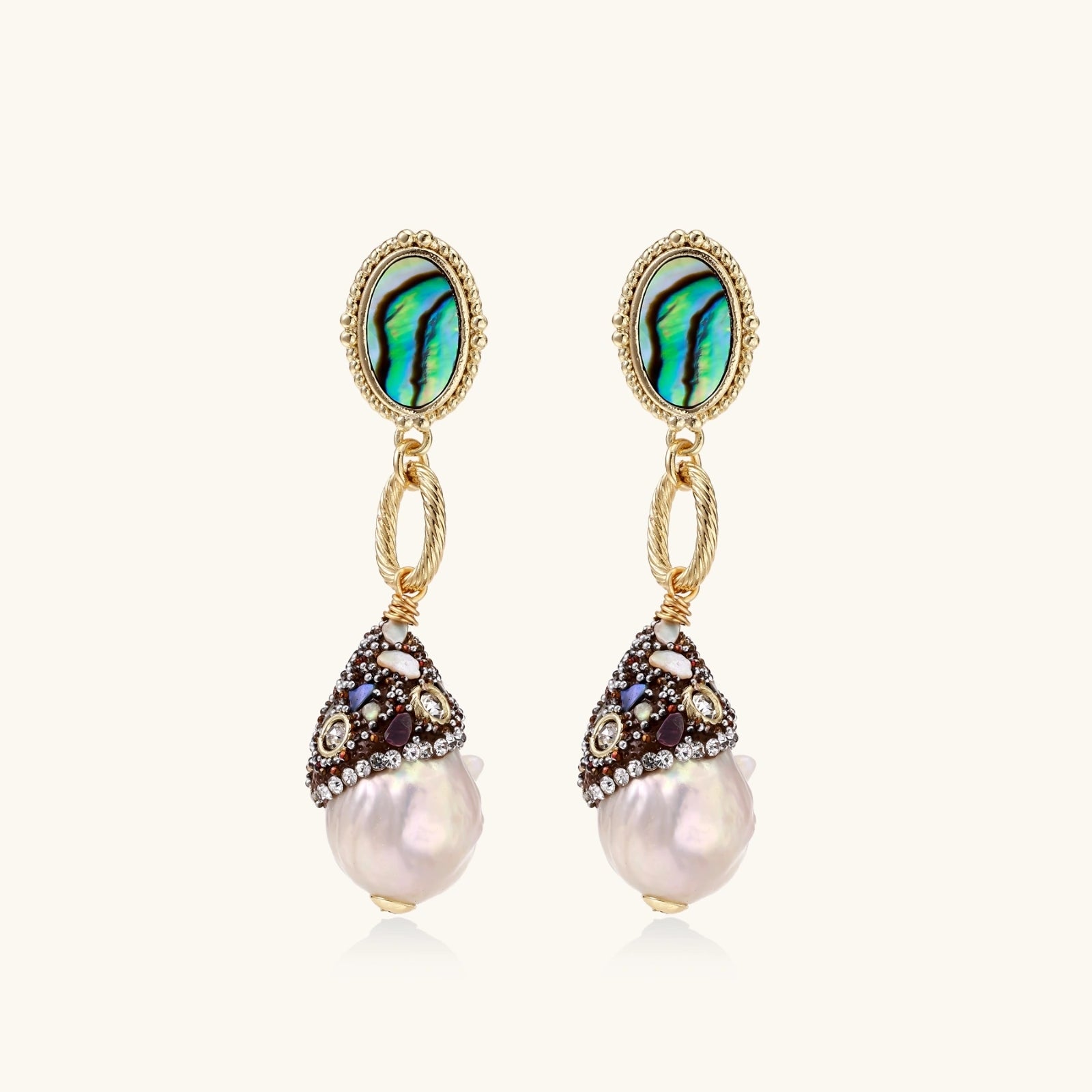 Close-up of 14K gold plated baroque pearl statement earrings with rope-twist detail