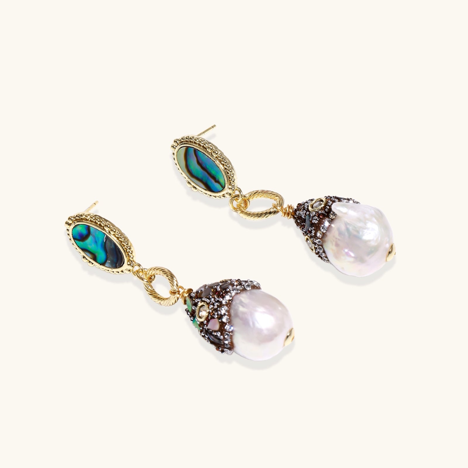 Baroque pearl drop earrings worn close-up — unique natural pearl jewelry
