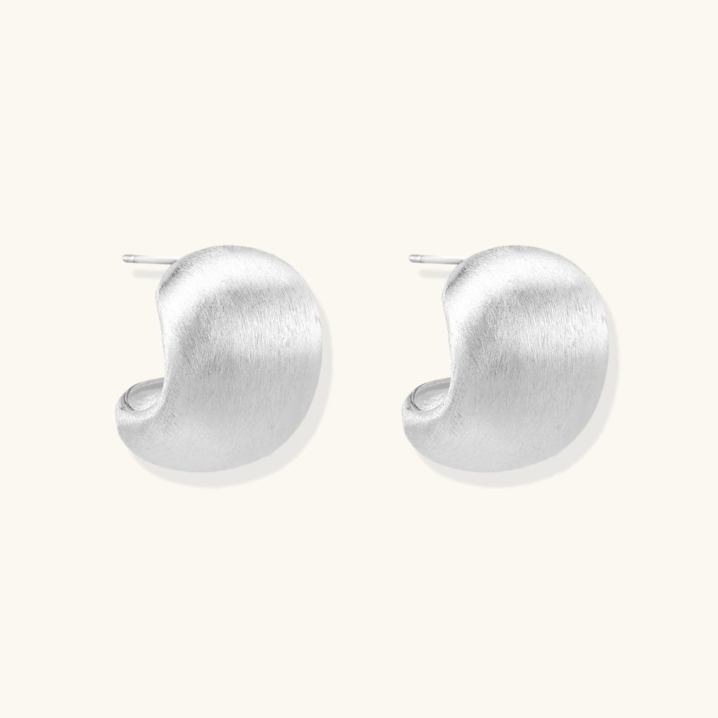 Side view of matte brushed sterling silver dome stud earrings
