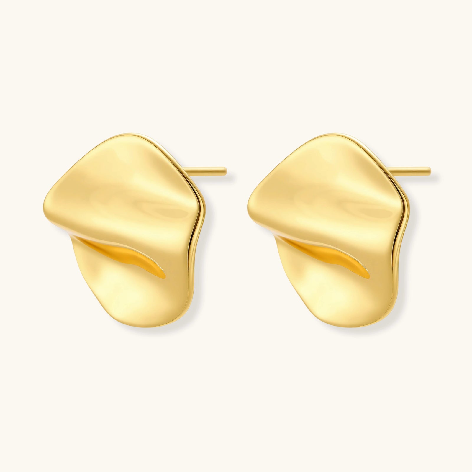 Side view of liquid gold flow statement stud earrings in sterling silver