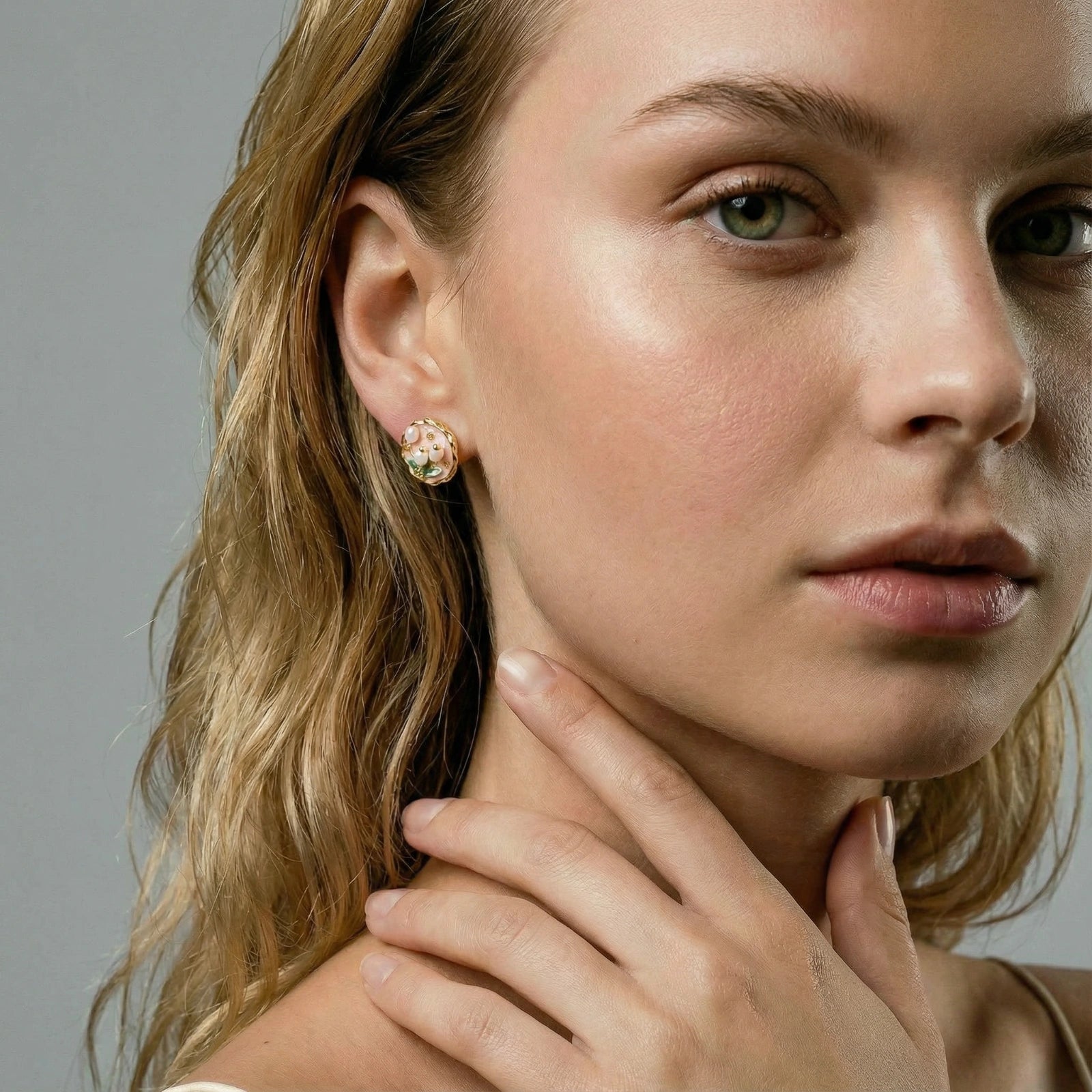 Woman wearing garden pearl stud earrings — vintage floral jewelry