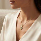 Brushed gold flower pendant necklace worn at the collarbone | VAHN Jewels
