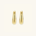 Polished gold teardrop huggie earrings in 14K gold-plated 925 sterling silver | VAHN Jewels