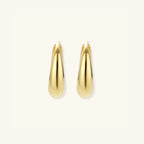 Polished gold teardrop huggie earrings in 14K gold-plated 925 sterling silver | VAHN Jewels