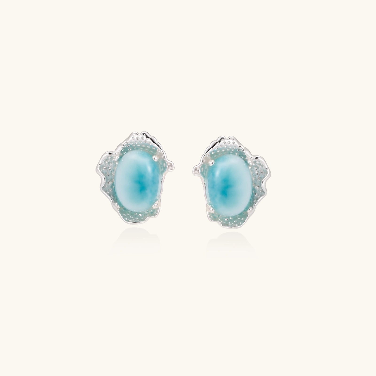 Larimar dream stud earrings in rhodium 925 silver with Caribbean larimar on white background