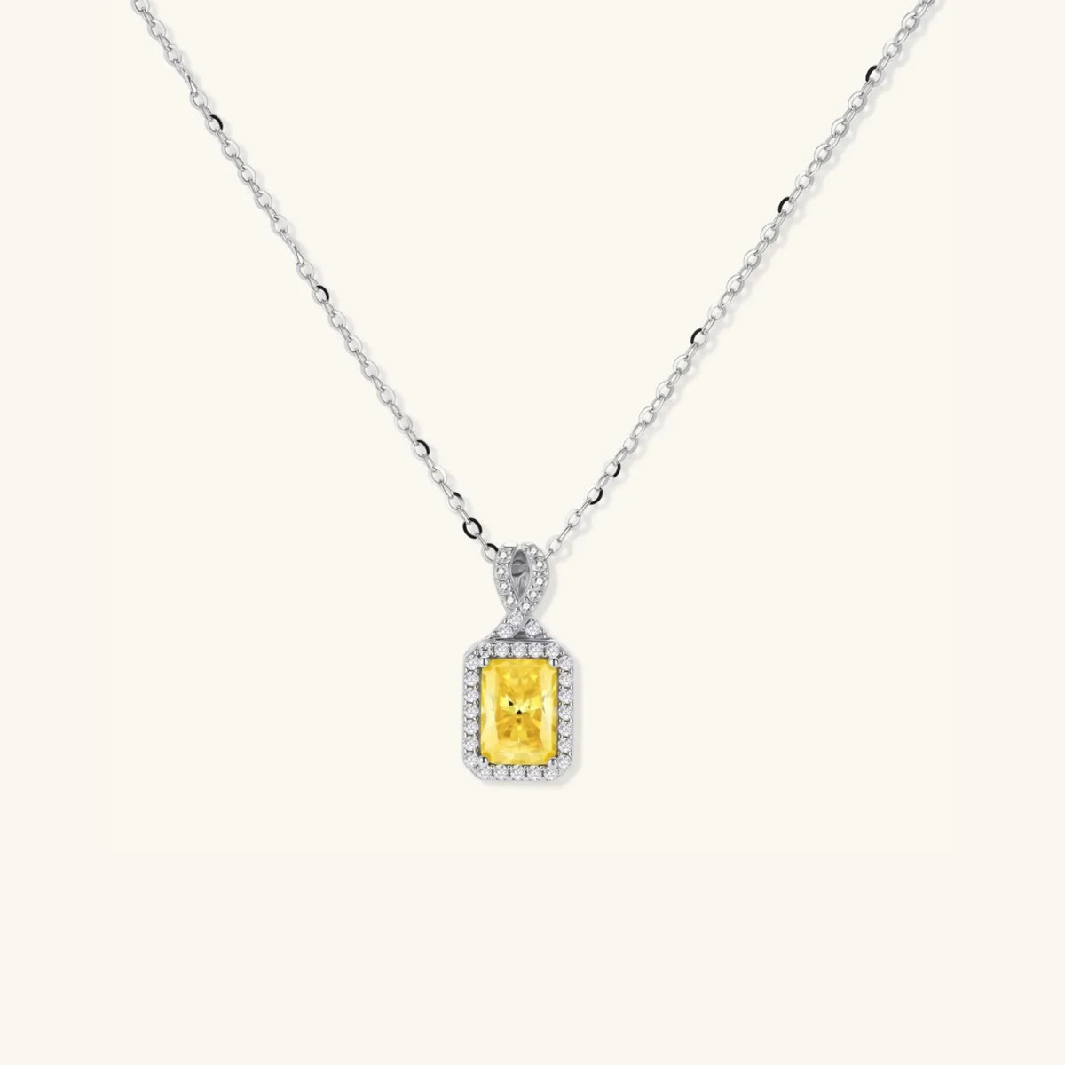 Yellow moissanite halo pendant necklace in platinum-plated 925 sterling silver | VAHN Jewels